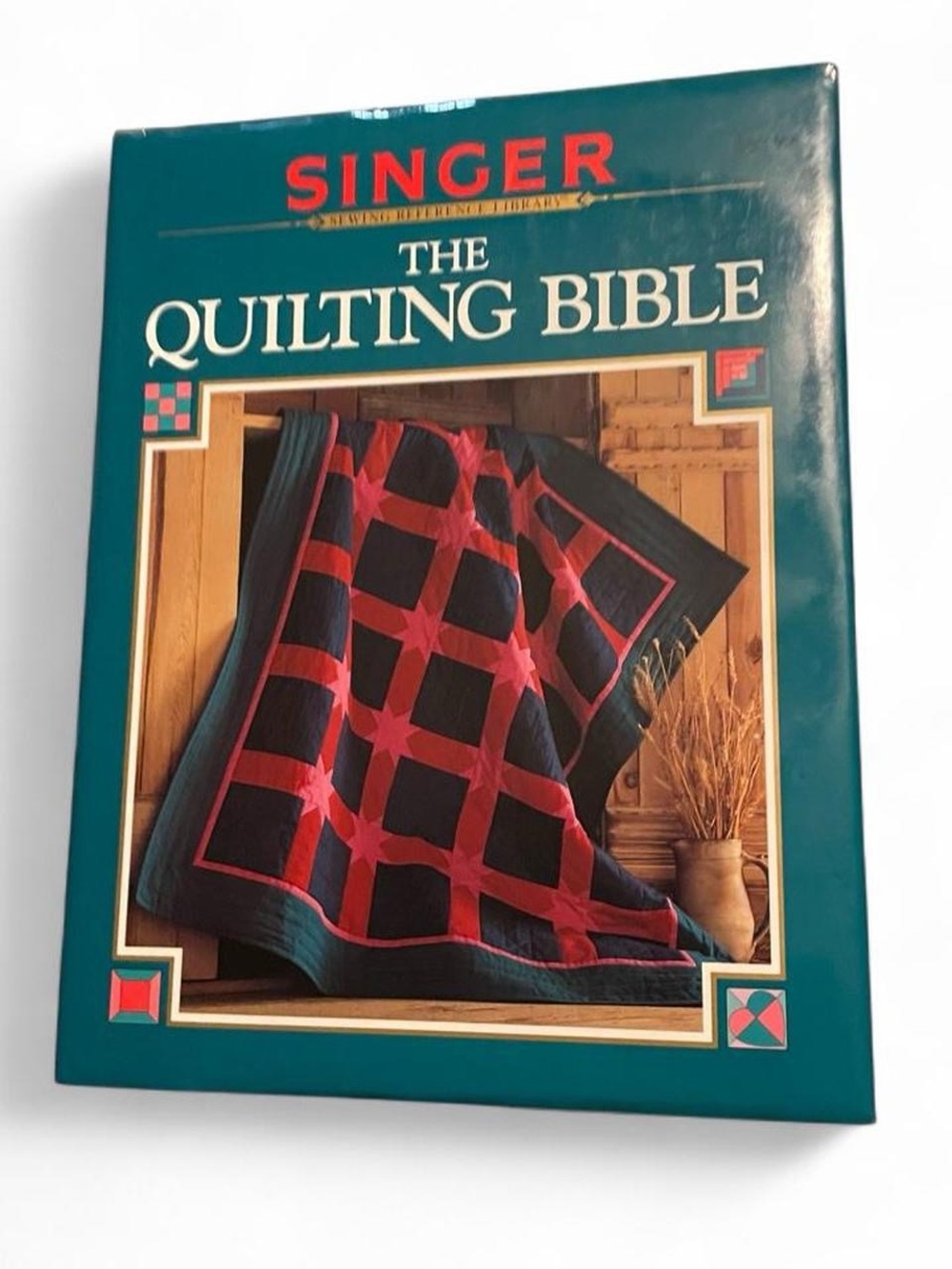 The Quilting Bible - Dark Teal and Red Cover